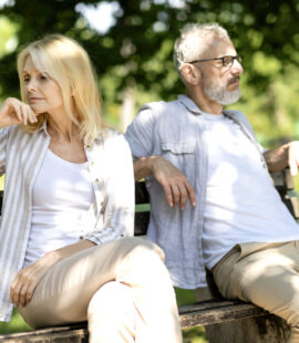 Relationship Crisis. Offended Mature Husband And Wife Sitting On Bench In Park After Argue, Senior Man And Woman Suffering Problems In Relations, Married Couple Angry After Quarrel
